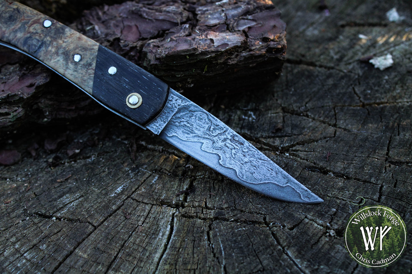 Hand-forged San-Mai slipjoint / 1084 & Antique Wrought Iron Blade with Bog Oak and Spalted Ash Scales