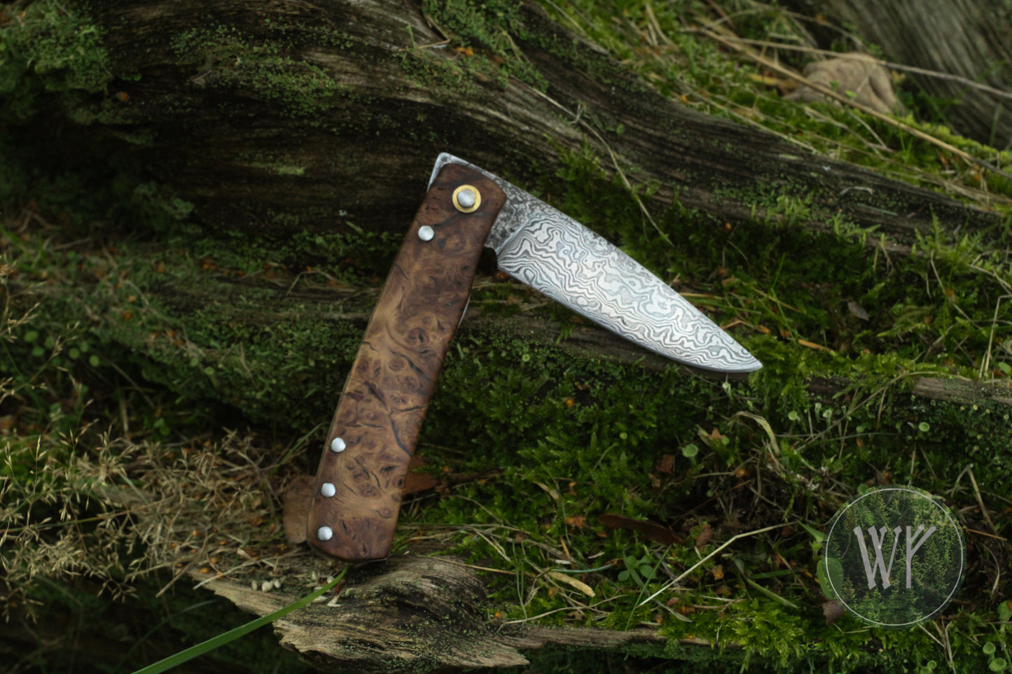 [RESERVED FOR GERD] Hand-forged dual-detente folder with Damascus Steel blade, Titanium Liners and Welsh Oak Burl Handle / Non-locking UK Legal Carry