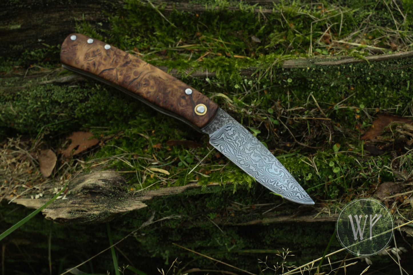 [RESERVED FOR GERD] Hand-forged dual-detente folder with Damascus Steel blade, Titanium Liners and Welsh Oak Burl Handle / Non-locking UK Legal Carry