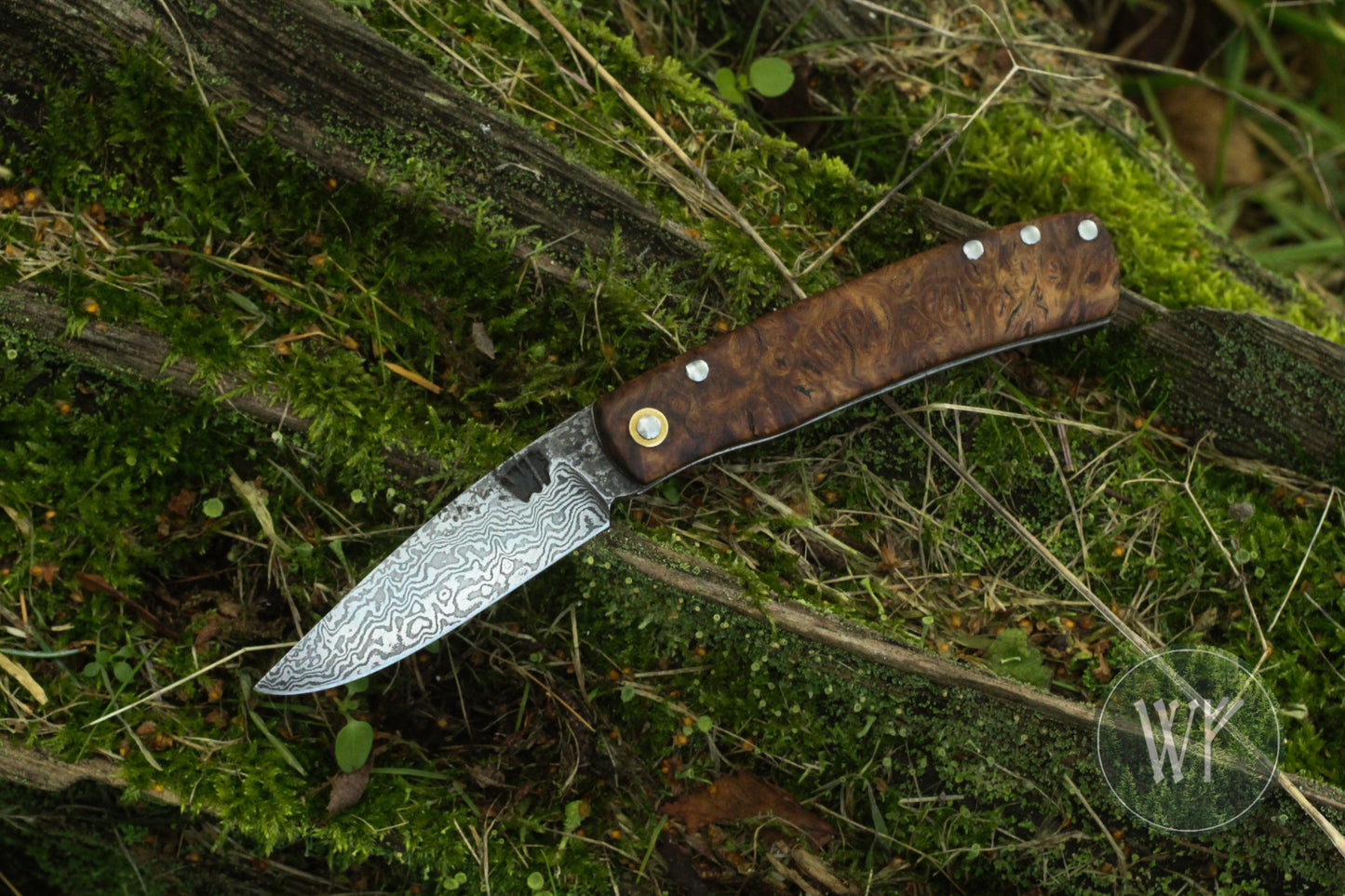 [RESERVED FOR GERD] Hand-forged dual-detente folder with Damascus Steel blade, Titanium Liners and Welsh Oak Burl Handle / Non-locking UK Legal Carry