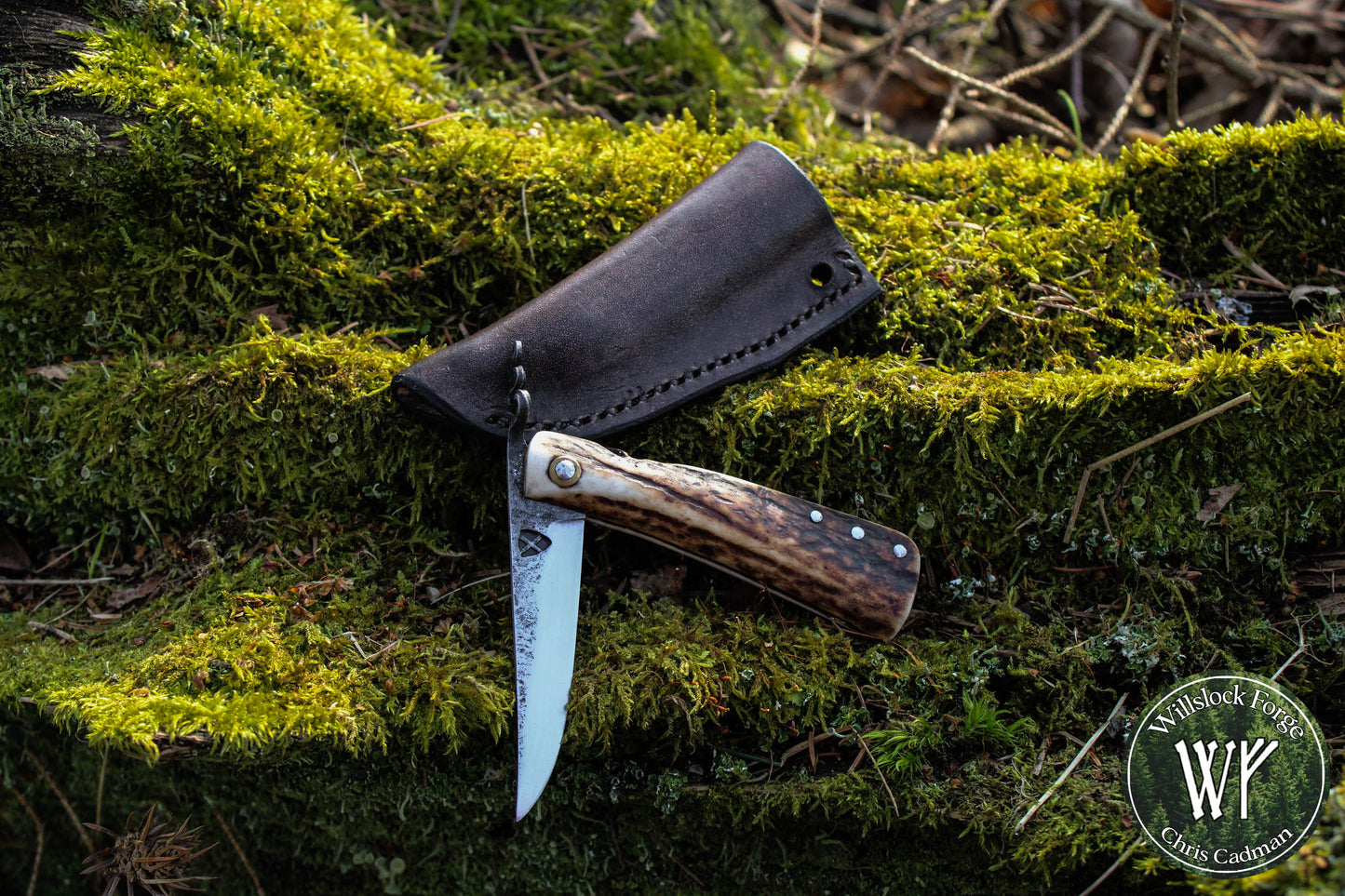 Primitive Mountain Man Friction Folder with antler handle and leather neck pouch