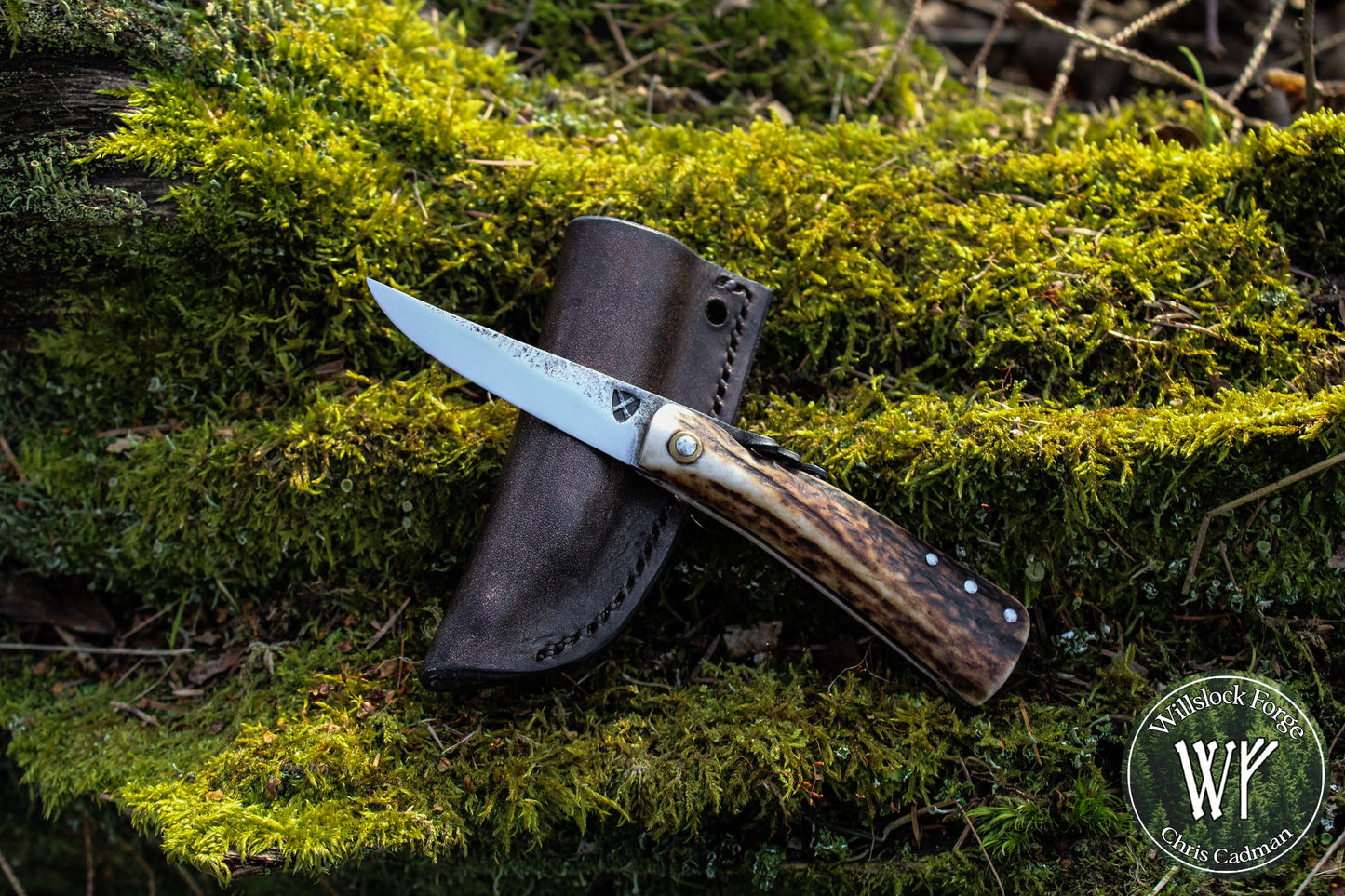 Primitive Mountain Man Friction Folder with antler handle and leather neck pouch