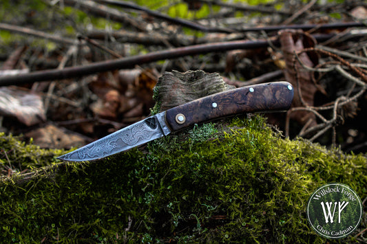 Hand-forged slipjoint folding knife / Raindrop Damascus Go-Mai Blade / Brass Liners & Bolsters / Amboyna Burl Scales
