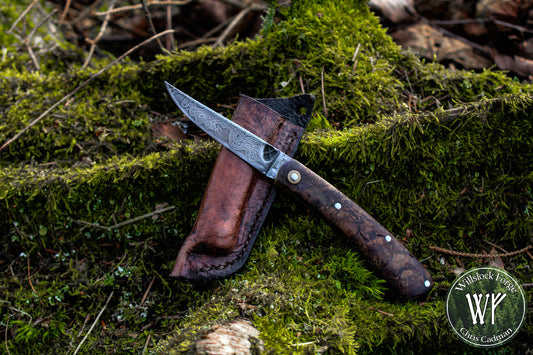 Hand-forged slipjoint folding knife / Raindrop Damascus Go-Mai Blade / Brass Liners & Bolsters / Amboyna Burl Scales
