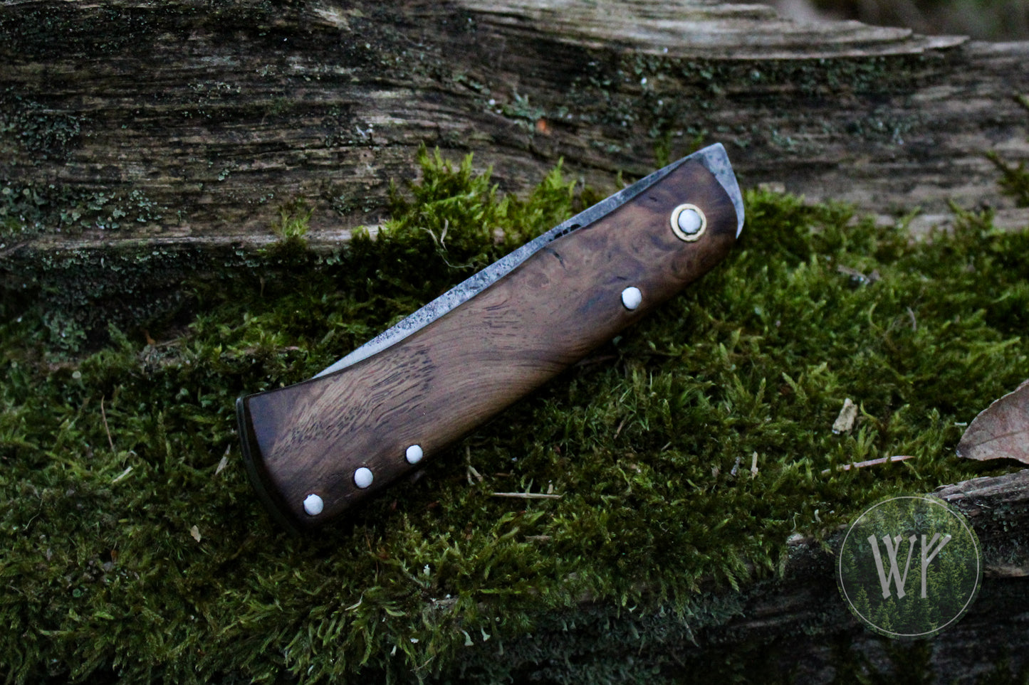 Hand-forged dual-detente folder with 1095 Carbon Steel blade, Titanium Liners and Scottish Oak Burr Handle / Non-locking UK Legal Carry